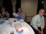 Past-President Carole Johnson receives an award with Pam Maloney and Ron Melbourne